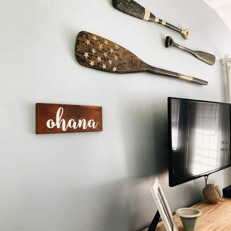 Gray TV Wall With Decorative Wooden Oars