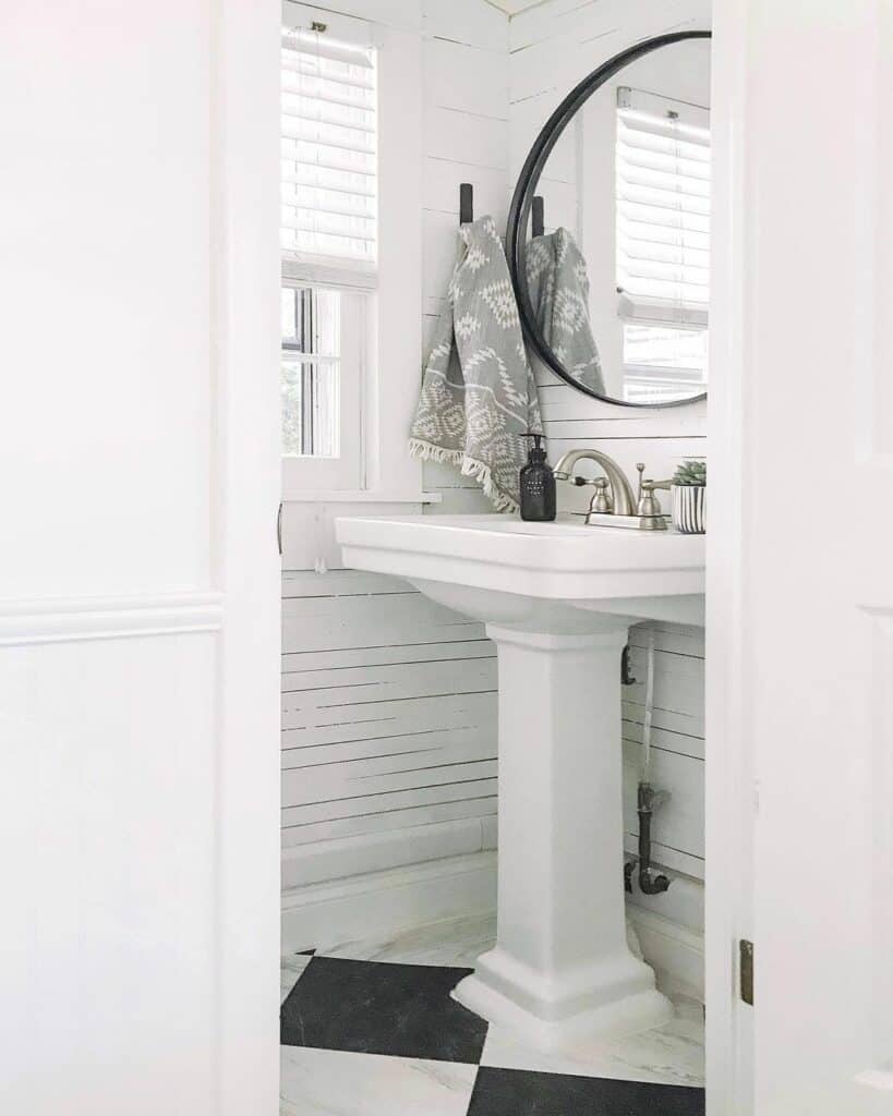 Half Bath With Black and White Design Soul & Lane