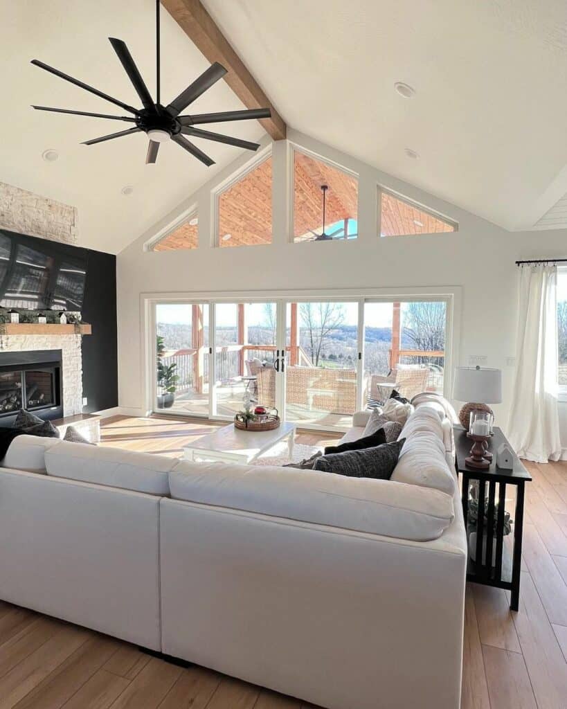 High-ceiling Living Room With Back of a Couch Décor