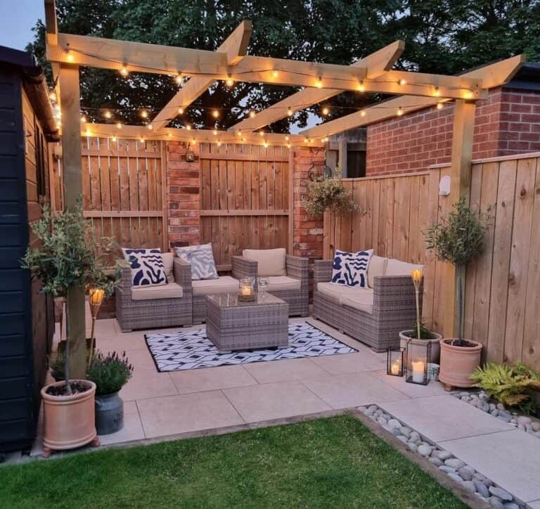 Light Wood Pergola With Gray Wicker Patio Set