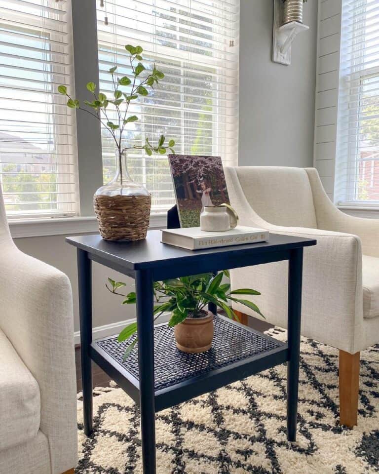 Living Room With Black Cane Side Table