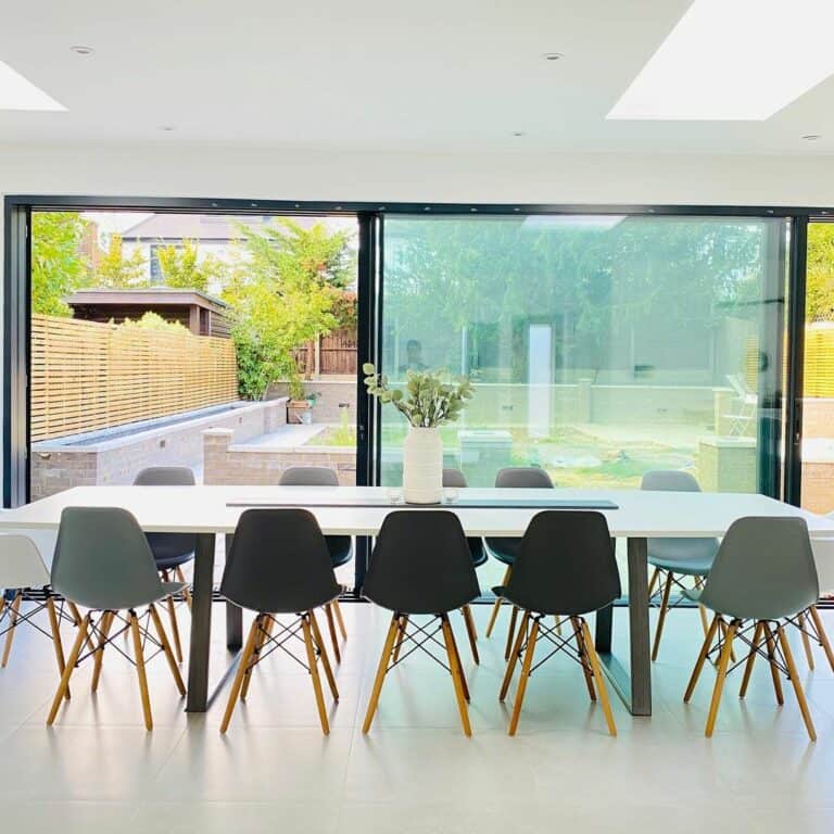 Minimalist White Table With Contemporary Chairs