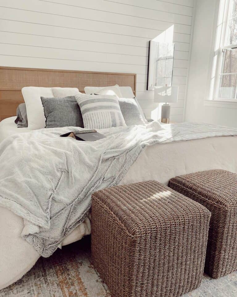 Modern Bedroom With Woven Ottomans