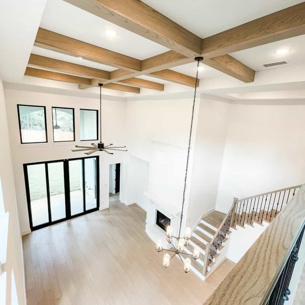 Modern Entry With Vaulted Ceilings and Exposed Beams