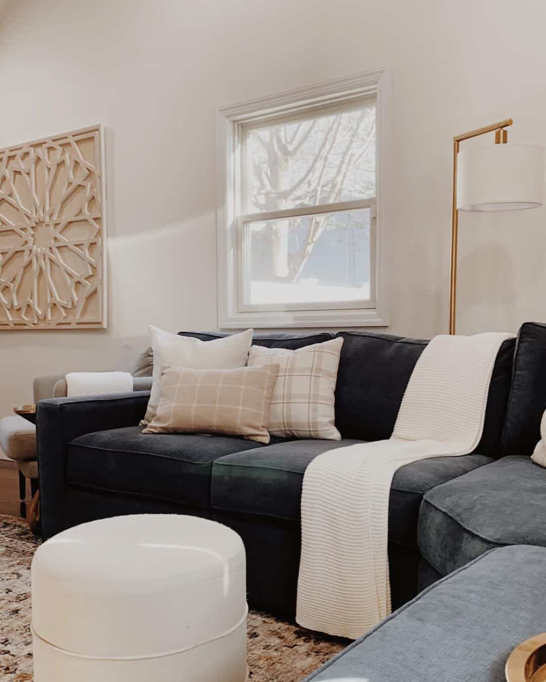 Modern Gold Floor Lamp Behind Dark Sofa Soul & Lane