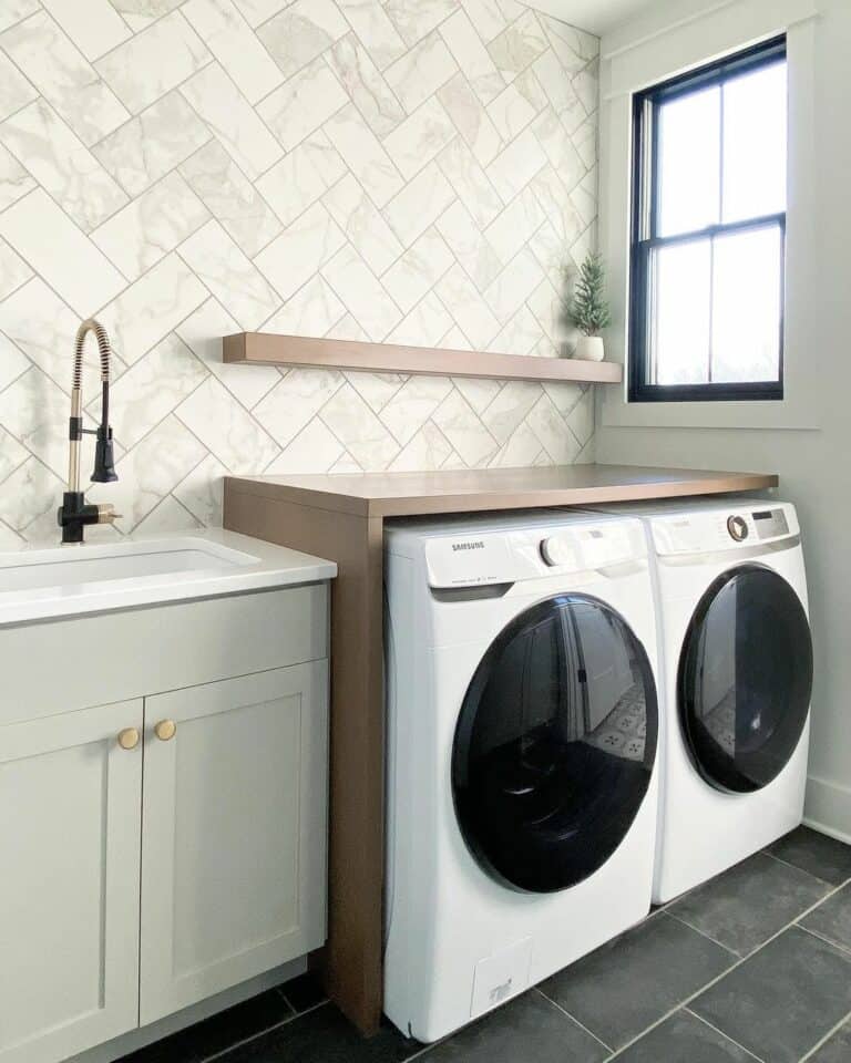 Modern Laundry Room With Marble Herringbone Wall Tiles