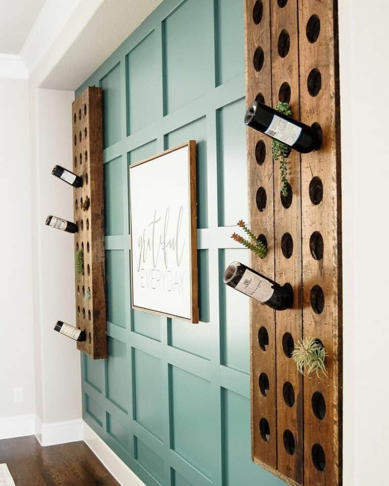 Modern Teal Accent Wall With Rustic Wine Bottle Storage