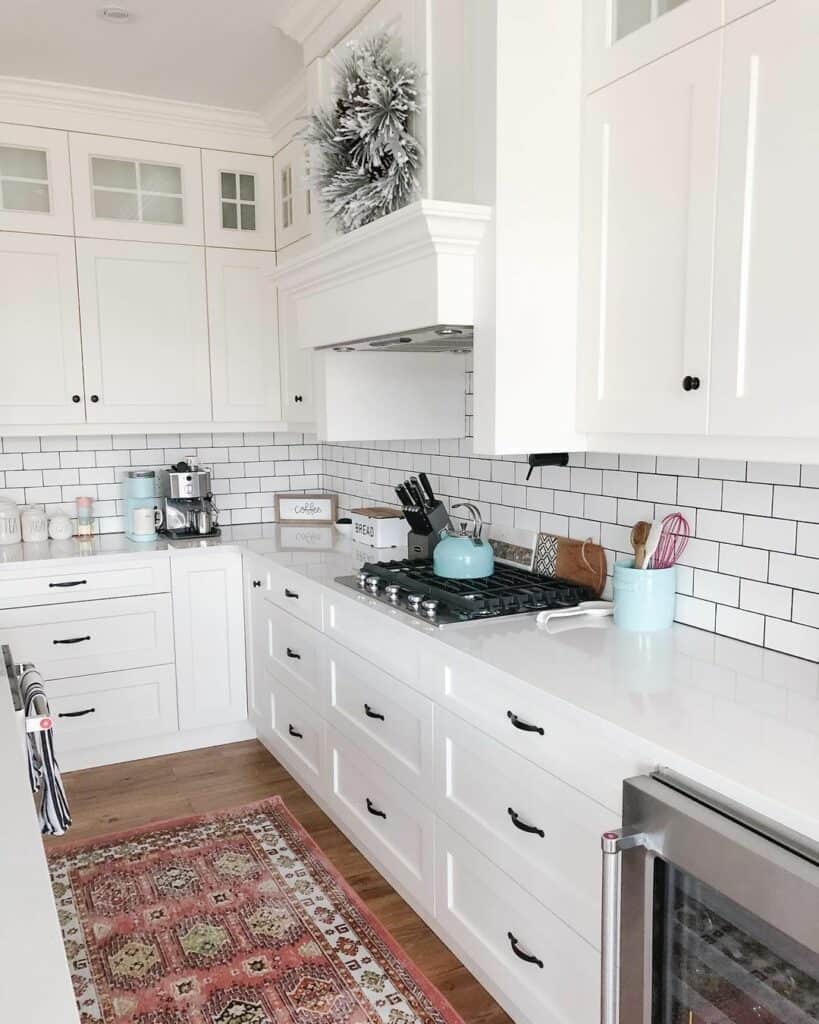 Modern White Kitchen With Red Runner