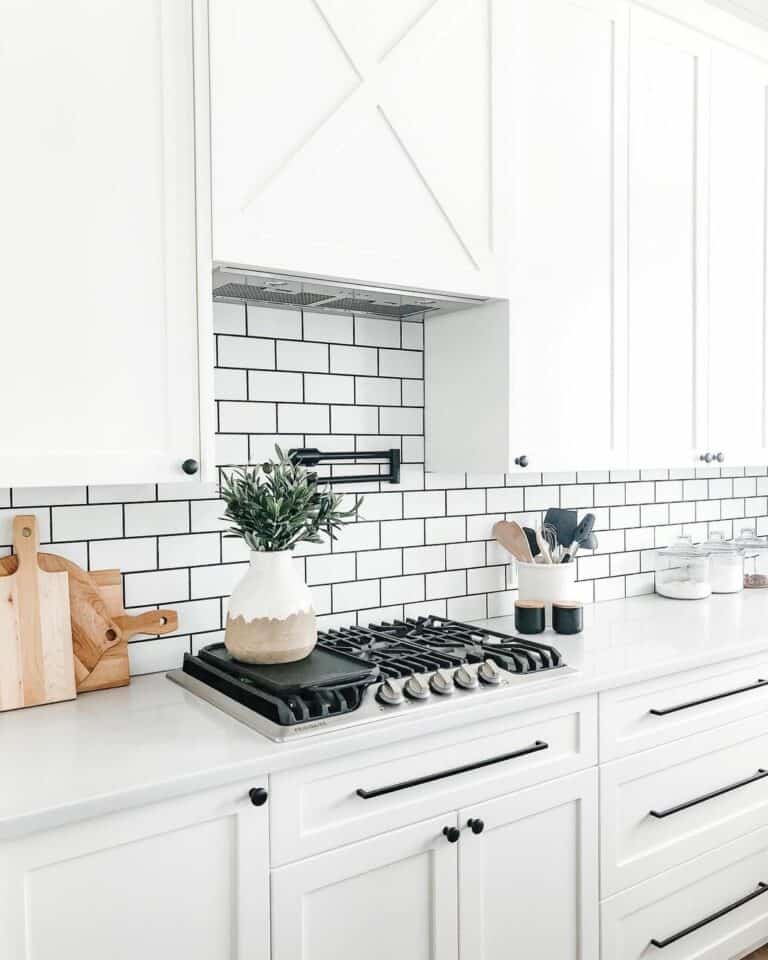 Modern White Kitchen With Subway Tile Backsplash
