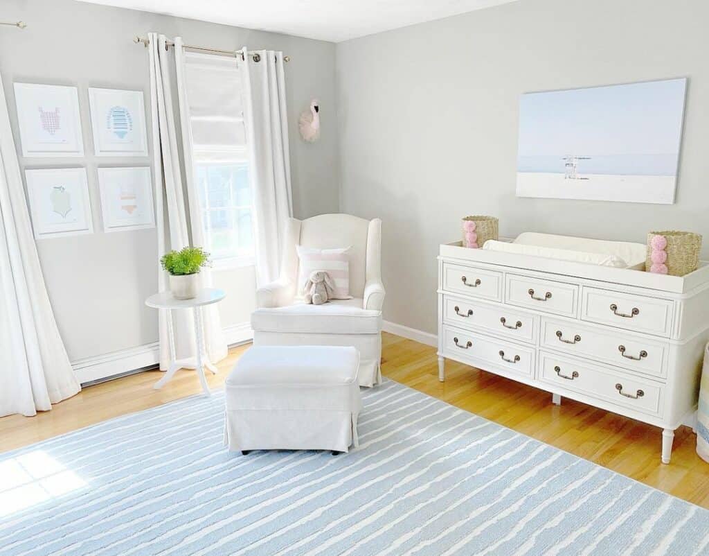 Nursery With Beachy White and Blue Striped Rug
