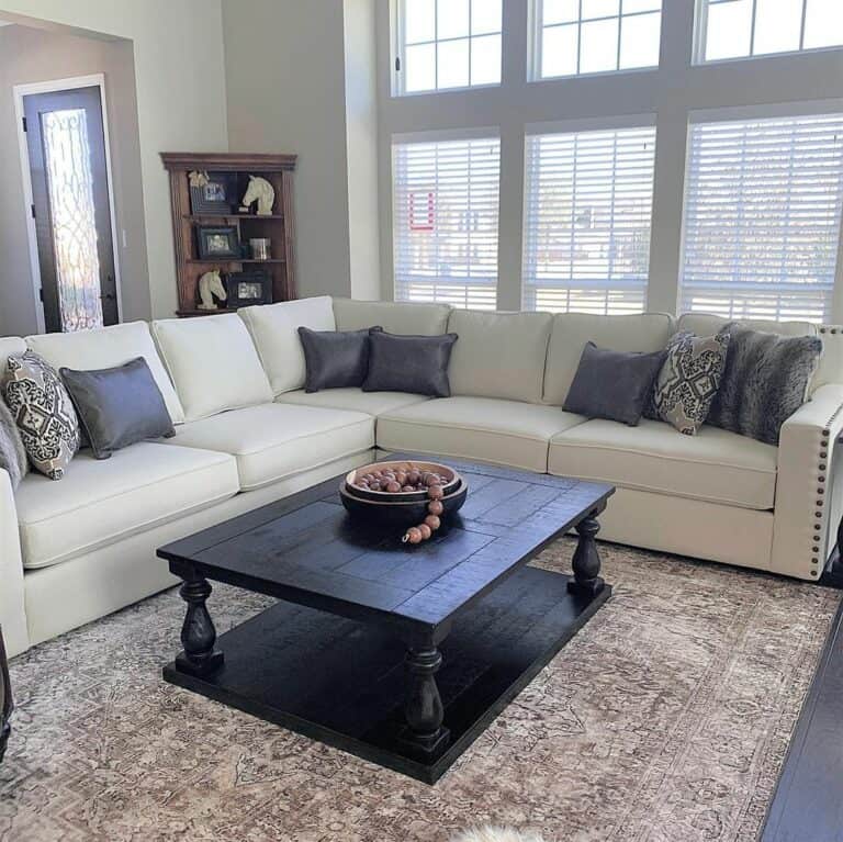 Off-white Sectional With Black Wood Coffee Table