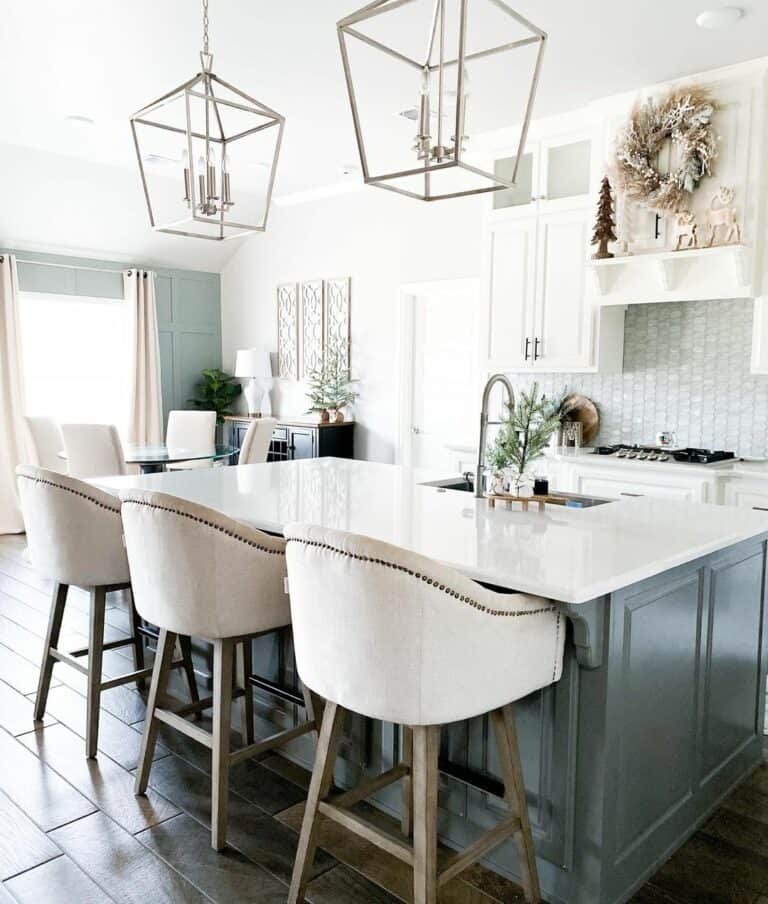 Pastel Accent Wall Design in a White Kitchen and Dining Area