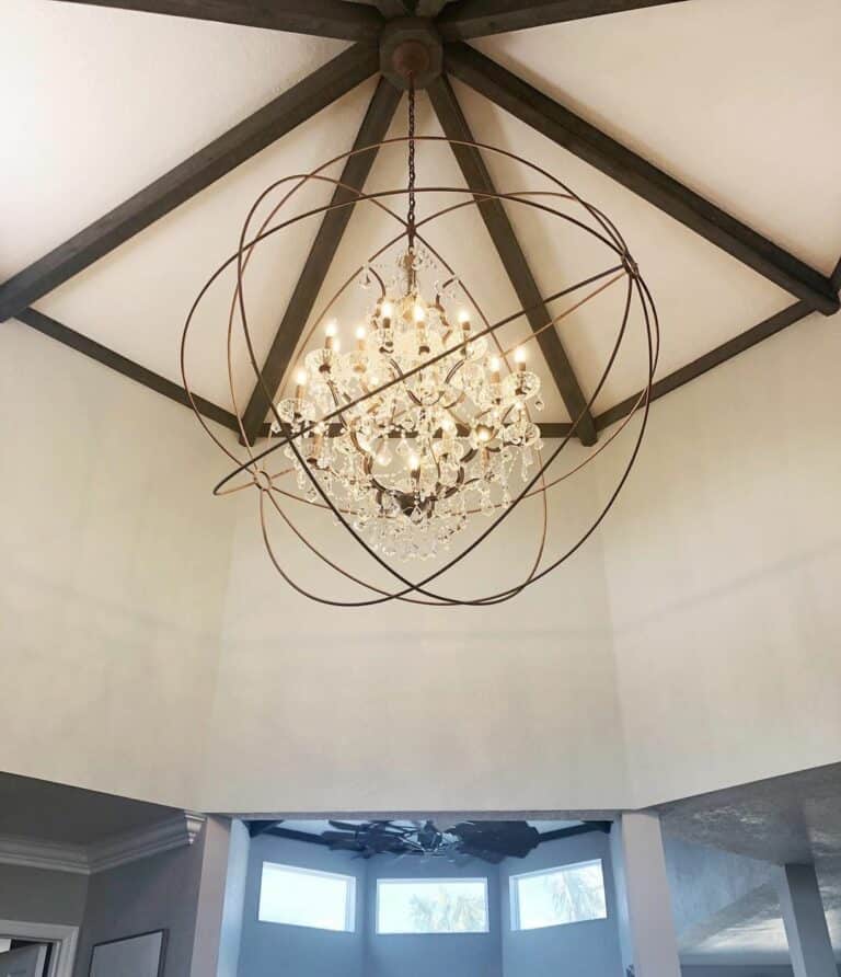 Pitched Farmhouse Entryway Ceiling With Exposed Wood Beams