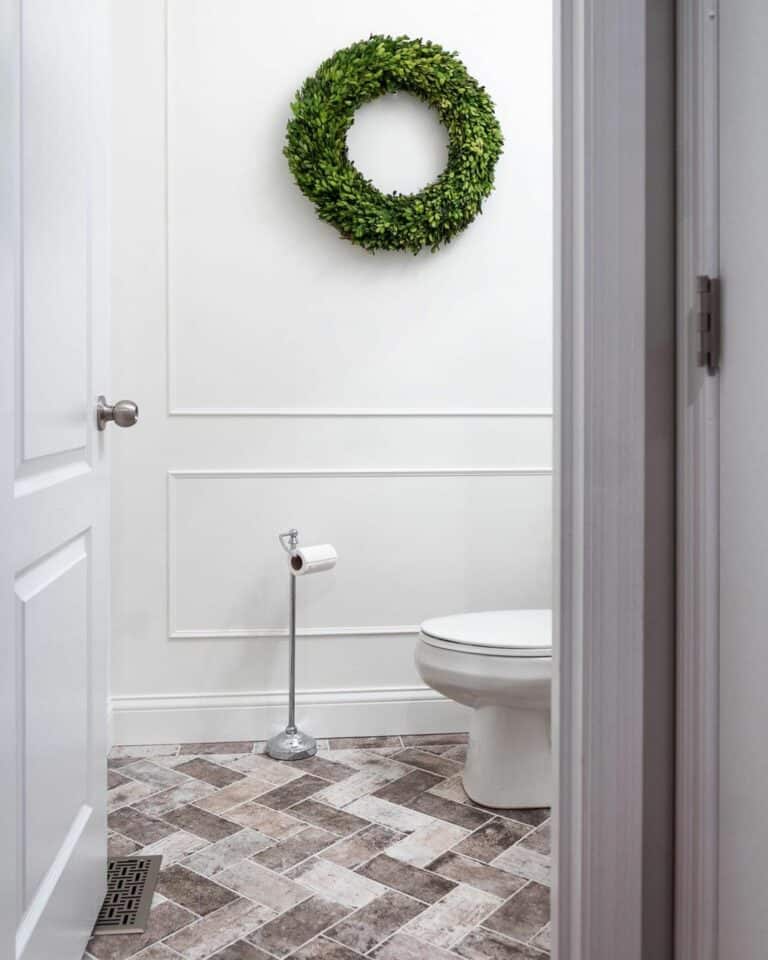 Powder Room With Tan Herringbone Floor Tiles
