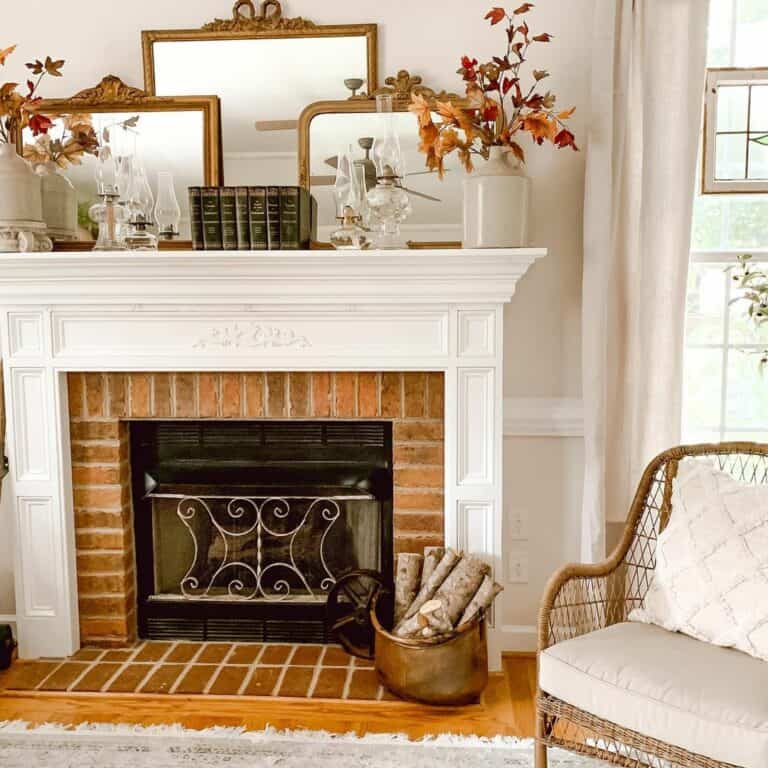 Red Brick Fireplace With Layered Mirrors