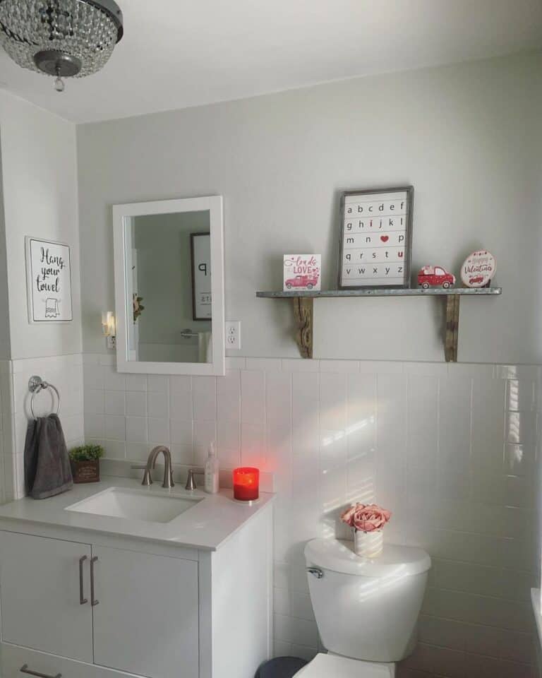 Simple White Bathroom With Mounted Shelves