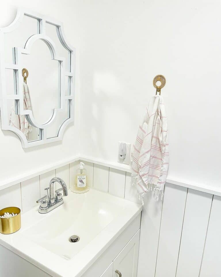 Small Guest Bathroom With a White Color Palette