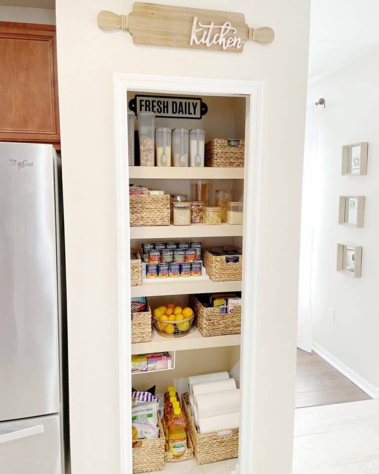 Small Pantry With Cream Walls and Rattan Baskets