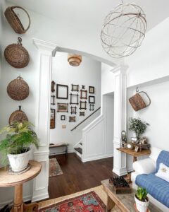 Stairwell Gallery Wall Layout With Wood Frames