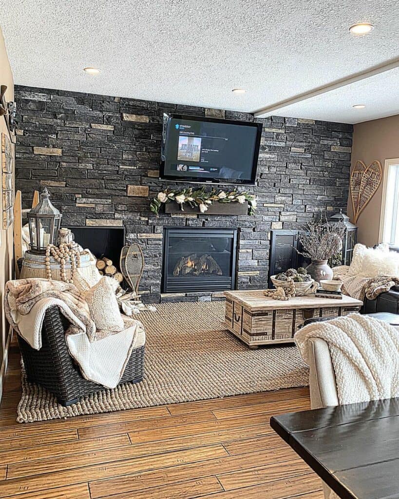 Stone Accent Wall With TV and Fireplace