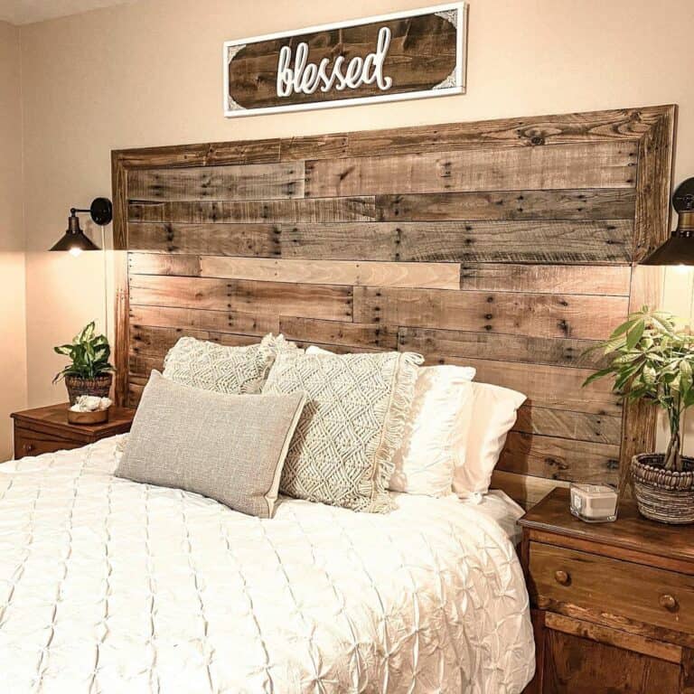 Textured Wood Headboard Flanked by Sconces