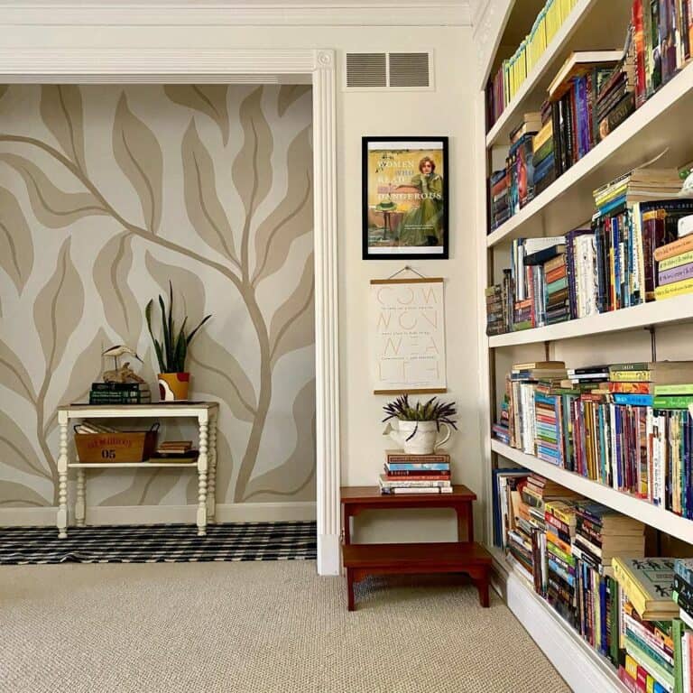 Upstairs Library Room With White Shelves