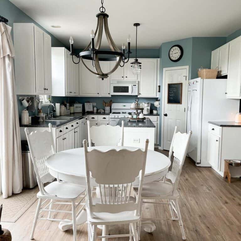 Vintage Kitchen With a White Dining Set and Cabinets