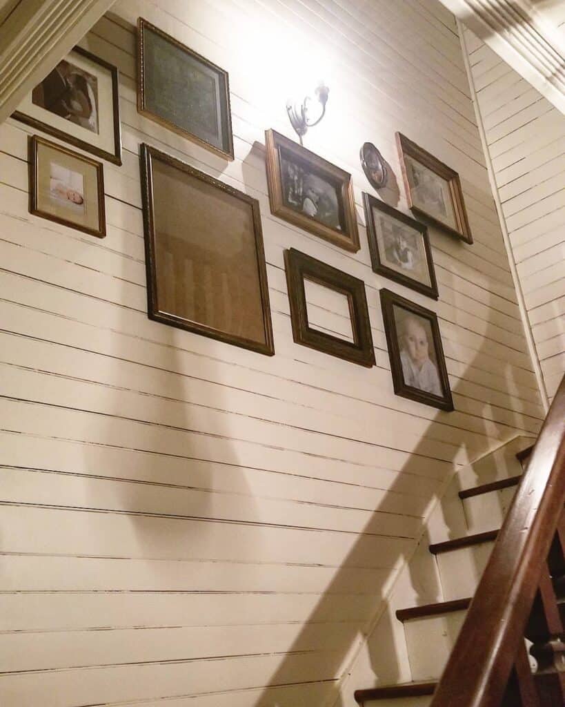Vintage Portrait Frames as Stairwell Décor