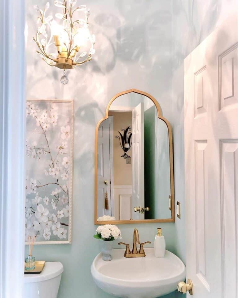 Whimsical Bathroom Design With Gold Accessories