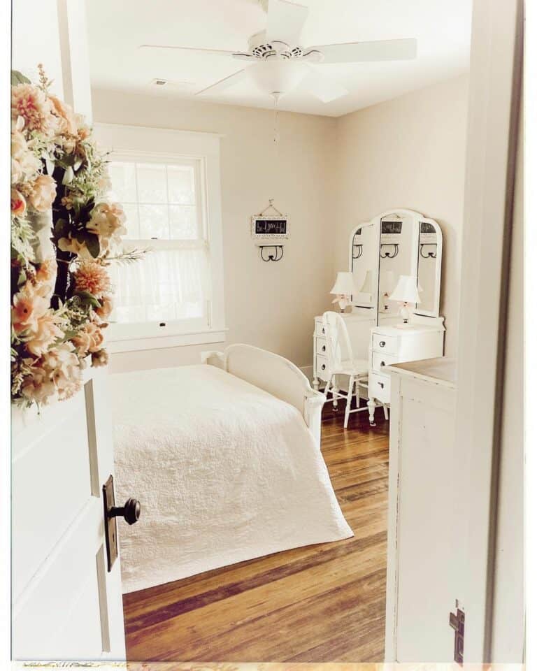 White Antique Bedroom With Hardwood Floors