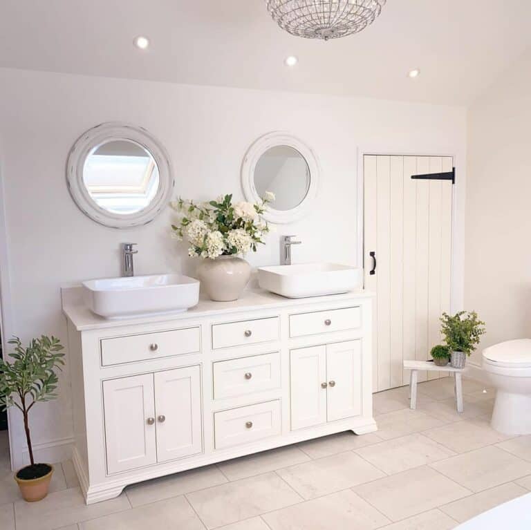 White Bathroom With Plant Décor