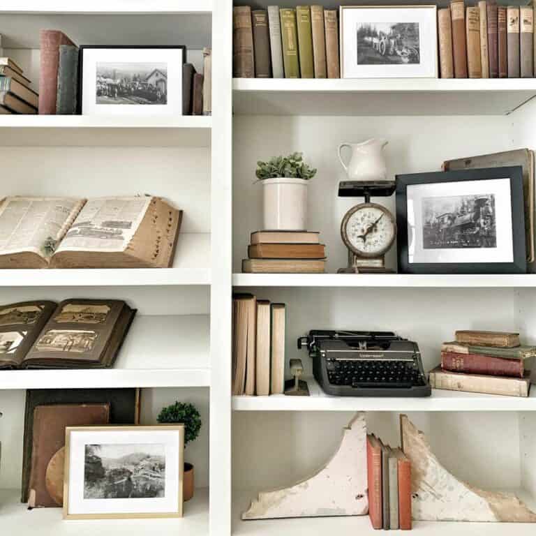 White Bookshelves With Antique Books