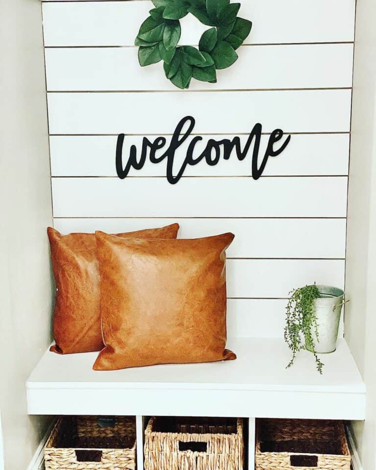 White Built-in Bench With Black Wall Letters