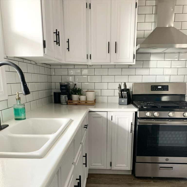 White Farmhouse Kitchen With Black Accents