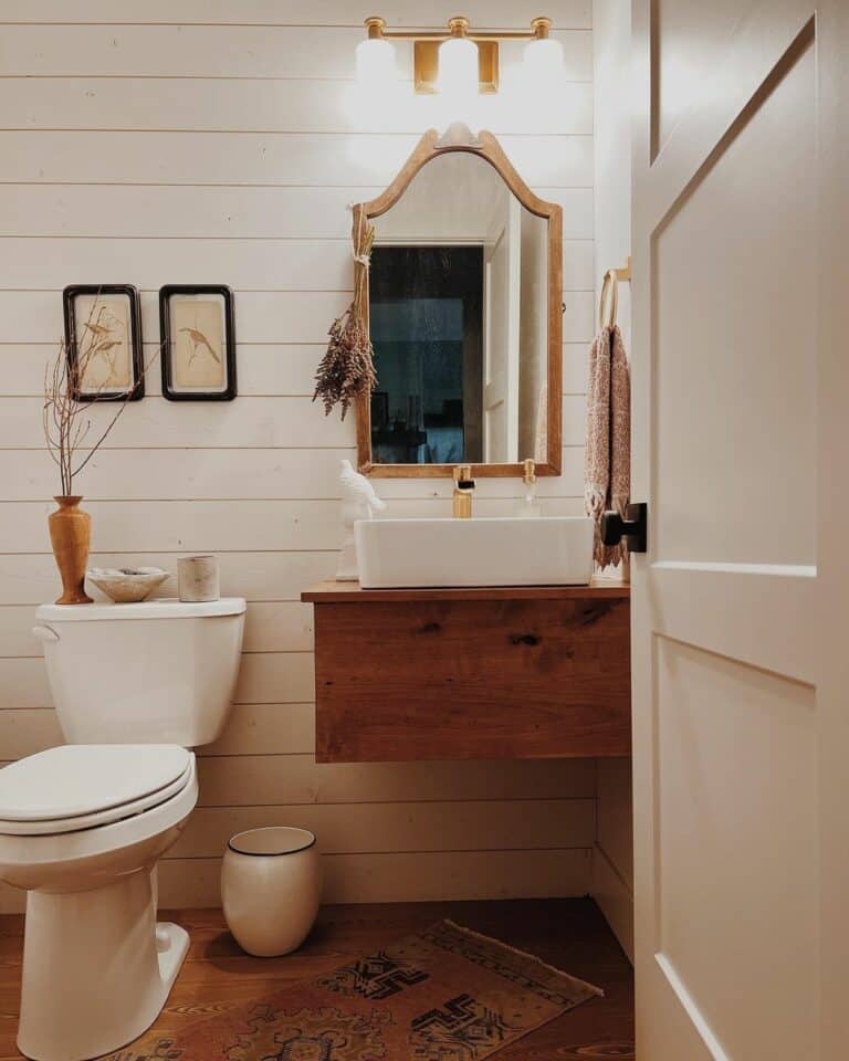 White Horizontal Shiplap Paneling To Expand a Small Bathroom