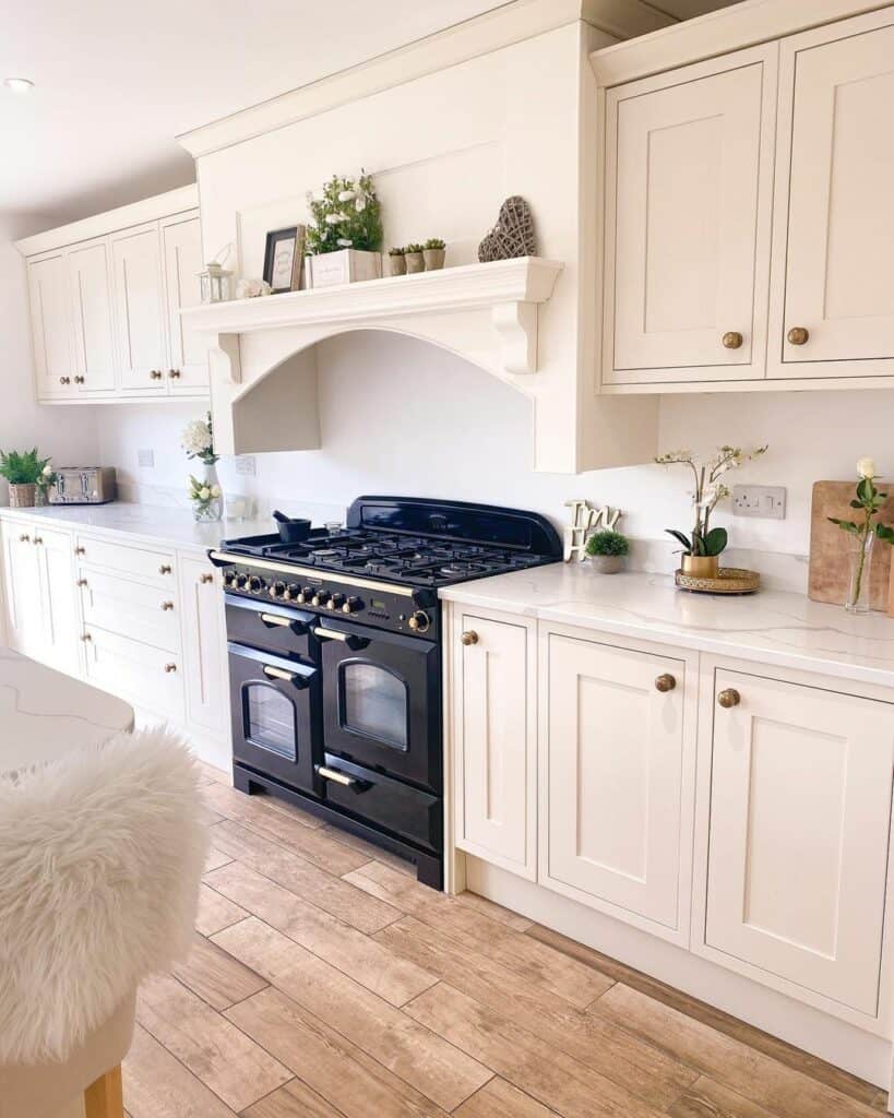 White Kitchen Counters With Bright Green Indoor Plant Décor