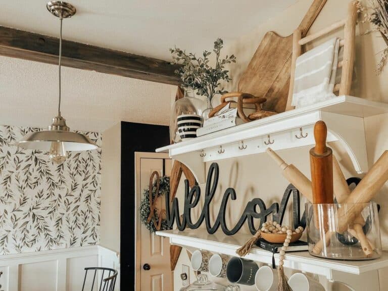 White Kitchen Shelves With Black Lettered Décor