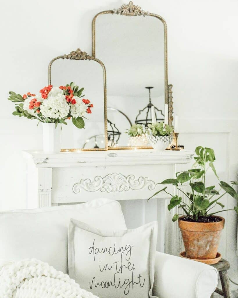 White Mantlepiece With Vintage Mirrors in Living Room