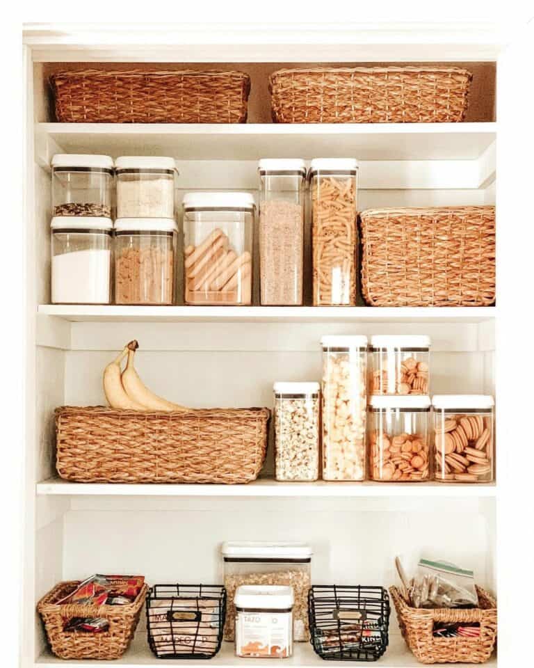 White Pantry With Rattan Baskets and Containers