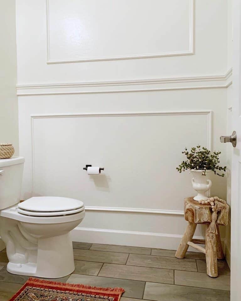 White Powder Room With Decorative Molding