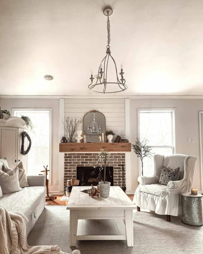 White Rustic Farmhouse Living Room With Brick Fireplace