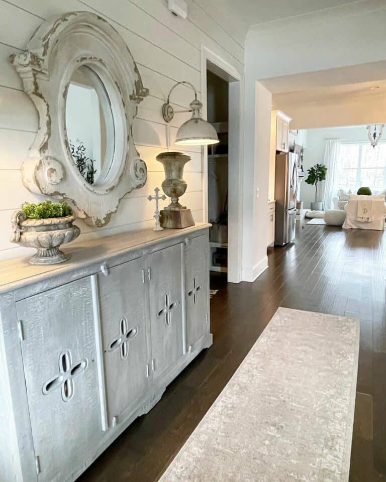 White Shiplap Entrance Hall With Gray Sideboard