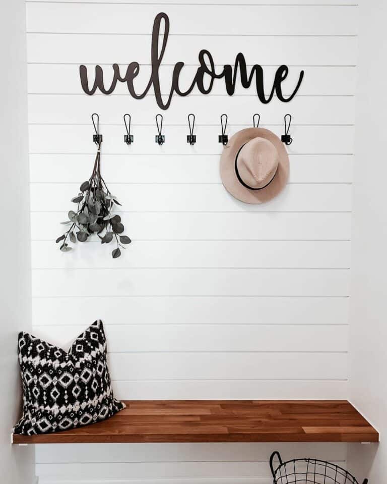 White Shiplap Entry Wall With Black Decorative Letters