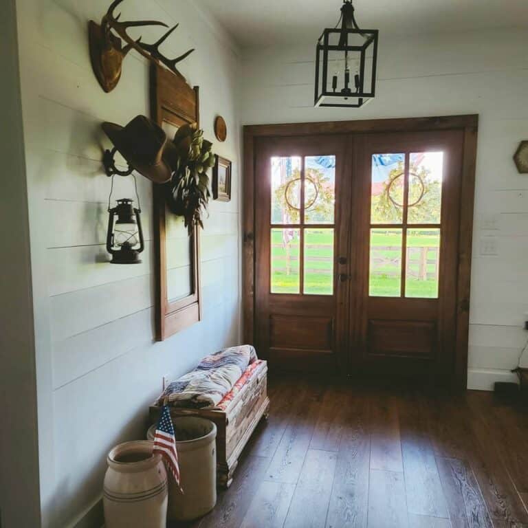 White Shiplap Entry With Stained Wood Double Doors