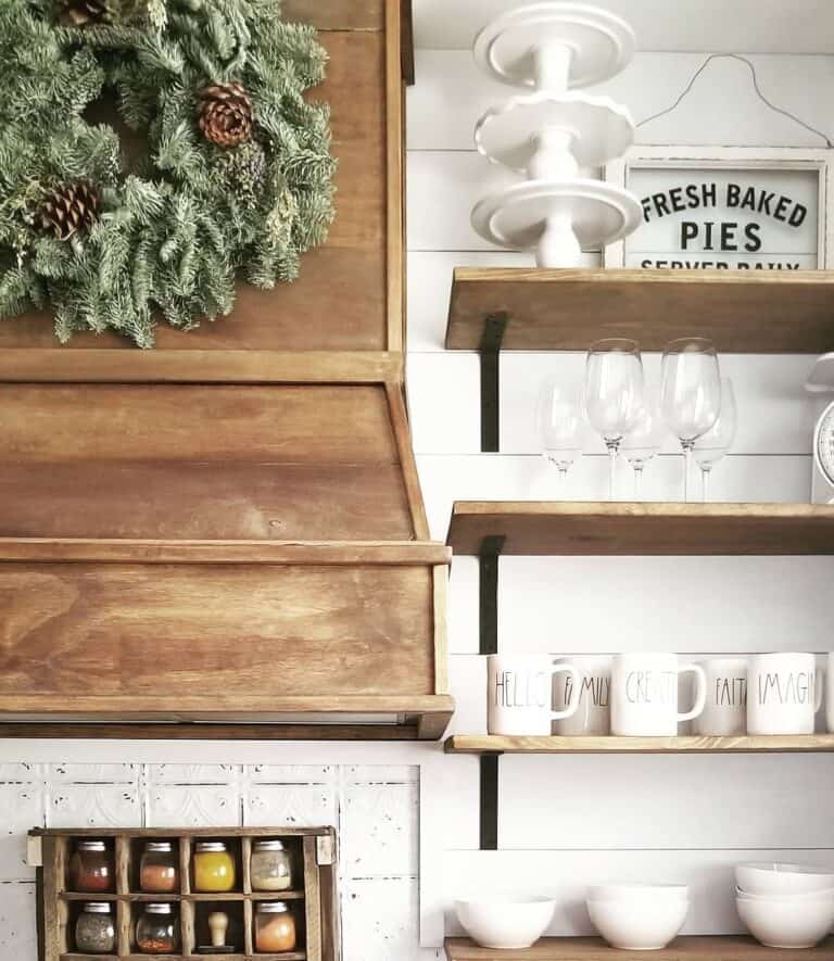 White Tableware Rests on Rustic Shelves