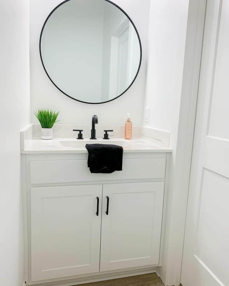 White Vanity Fitted Between Walls