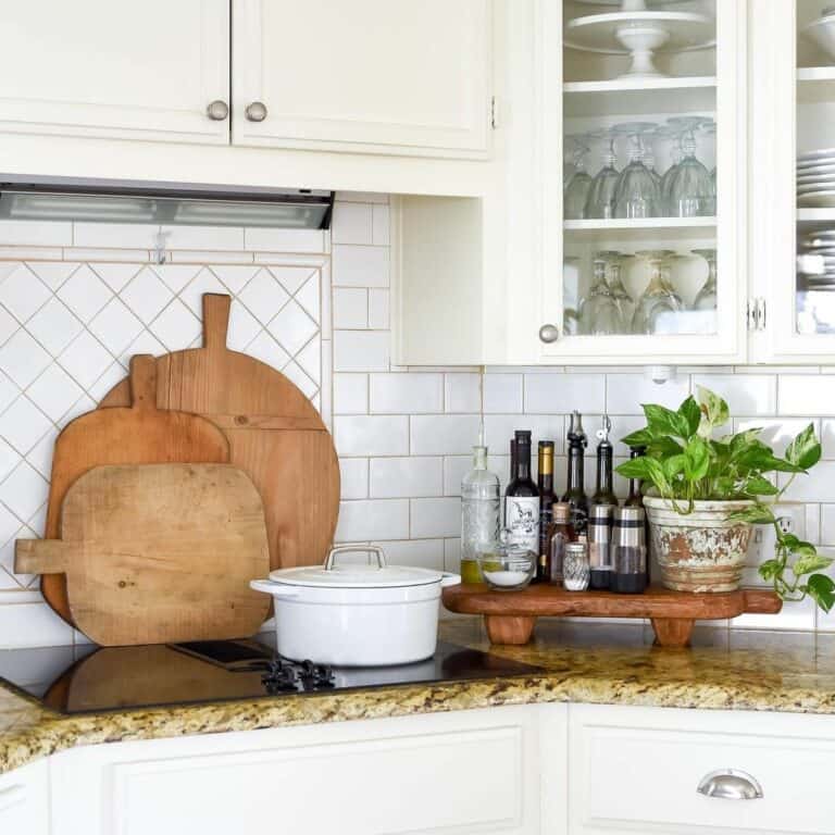 White Vintage Kitchen With Granite Countertop