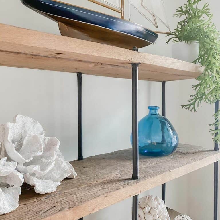 Wood and Black Metal Shelves With Coastal Décor