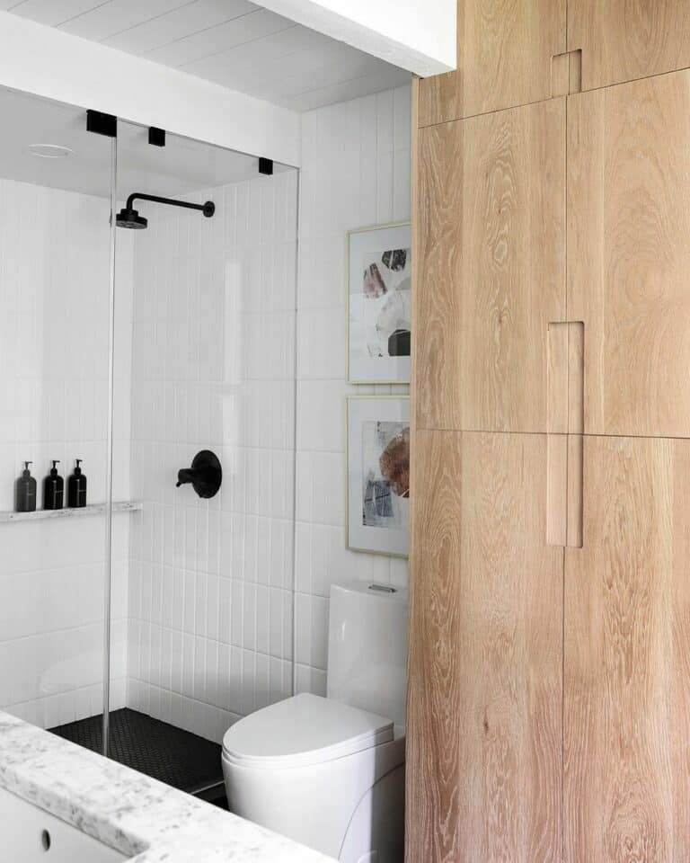Wood and White Bathroom With Wall Décor