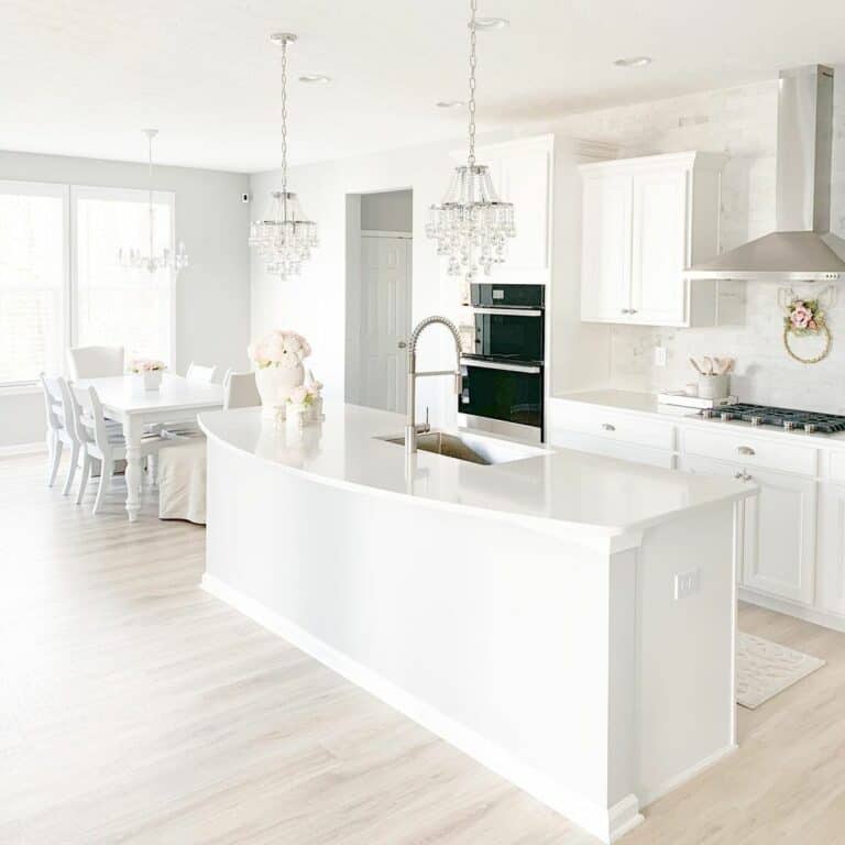 All-white Kitchen With Crystal Chandelier Lighting